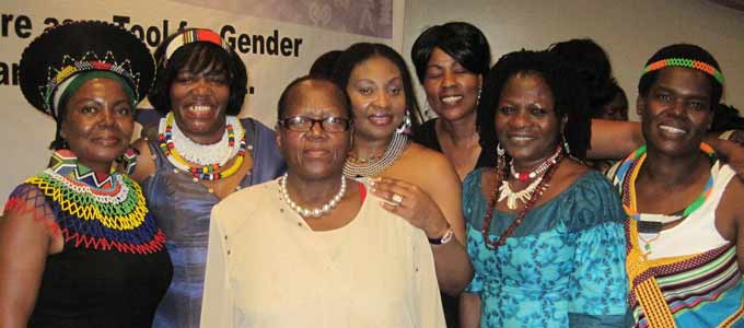 Yvonne Chaka Chaka (4th from left), Della in blue next to her